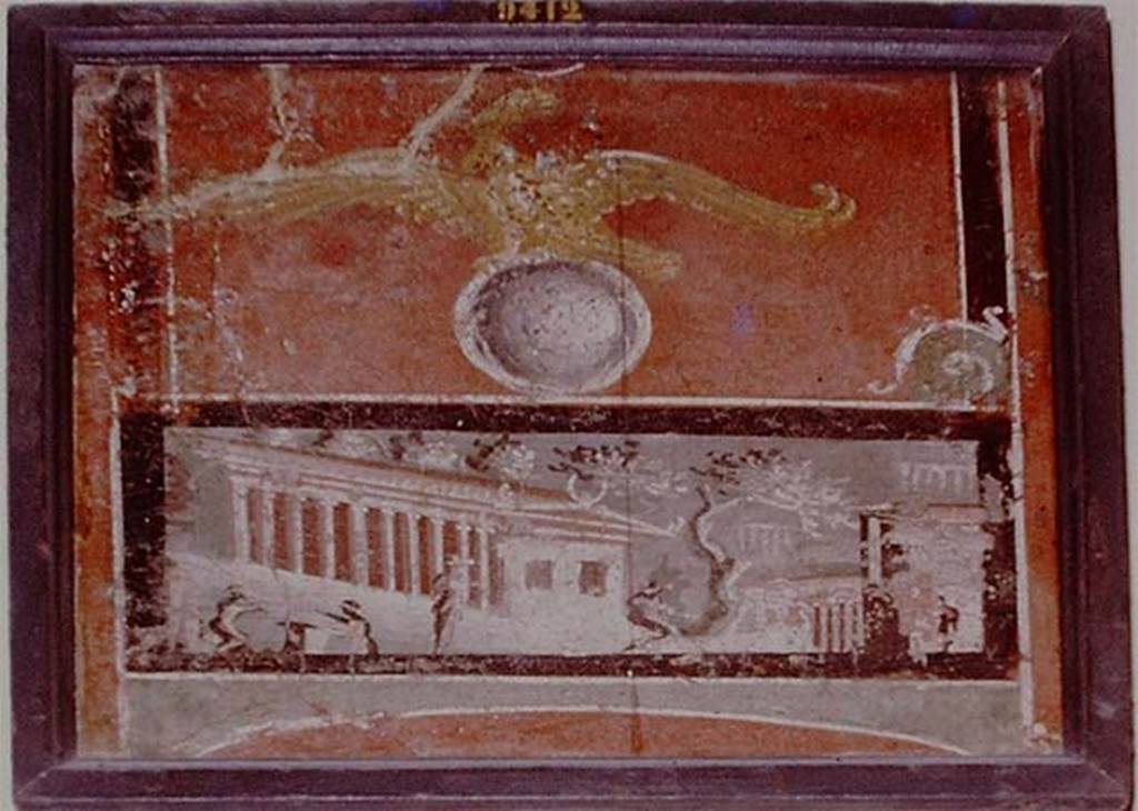 HGW24 Pompeii. 1975. Architectural landscape view with villas, surmounted by an eagle on a globe.
Now in Naples Archaeological Museum. Inventory number 9412. Photo by Stanley A. Jashemski.
Source: The Wilhelmina and Stanley A. Jashemski archive in the University of Maryland Library, Special Collections (See collection page) and made available under the Creative Commons Attribution-Non-Commercial License v.4. See Licence and use details.
Detail from J75f0552
According to Pagano and Prisciandaro, this was found (21st September 1771, PAH, 1,1,260, Addendum 157, with note 334) in room numbered 22 on the plan by La Vega (Fontaine’s room 2,10) but does not seem visible on the drawings/paintings above, perhaps it is from number 23 (Fontaine, room 2,12, which we have not photographed).
(Note 334 for Addendum 157 reads: N.22 Pianta di La Vega. Pitture. Carro di Diana. Carro di Apollo. Figura. Veduta. Canestro con frutta. Pesci. Fregi con grifi e lire.)
See Pagano, M. and Prisciandaro, R., 2006. Studio sulle provenienze degli oggetti rinvenuti negli scavi borbonici del regno di Napoli. Naples: Nicola Longobardi,(p.71). 
(Villa Diomedes Project – area 16)
(Fontaine’s room 2,10)