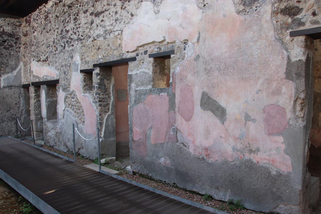 HGW24 Pompeii. Villa of Diomedes. October 2023. 
Looking east along south side of peristyle, with doorways from south portico. Photo courtesy of Klaus Heese.