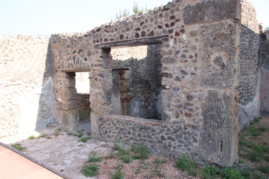 HGW24 Pompeii. Villa of Diomedes. October 2023. 
Doorway to corridor and window to room on north side of tablinum, on right. Photo courtesy of Klaus Heese.