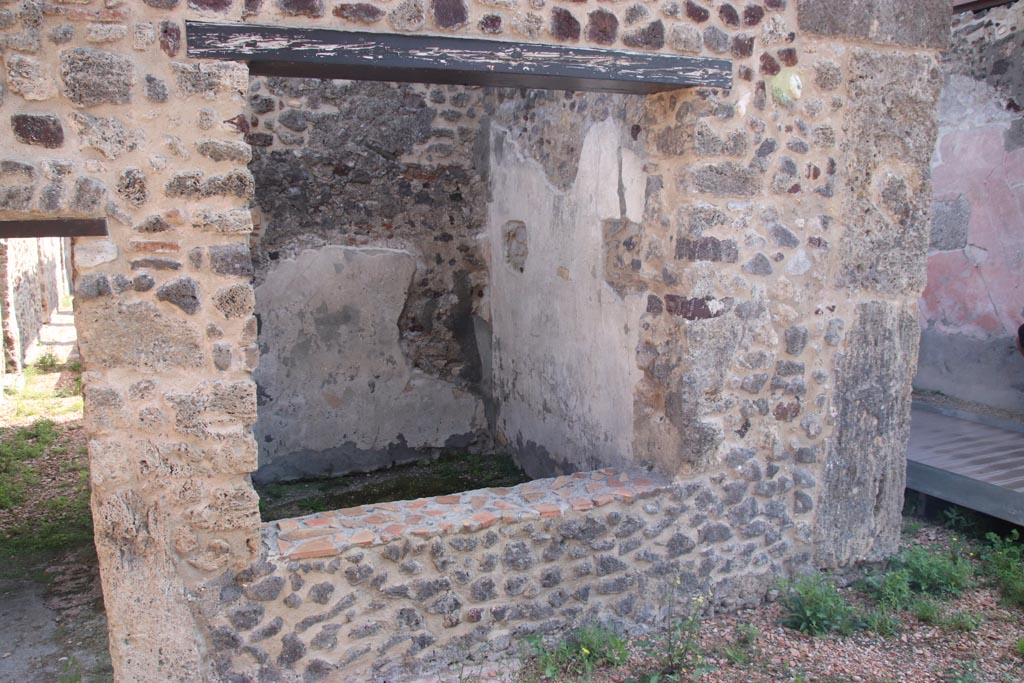 HGW24 Pompeii. Villa of Diomedes. October 2023. 
Looking east through window into room on north side of tablinum. Photo courtesy of Klaus Heese.
(Villa Diomedes Project – area 33).
(Fontaine, room 2,6,).