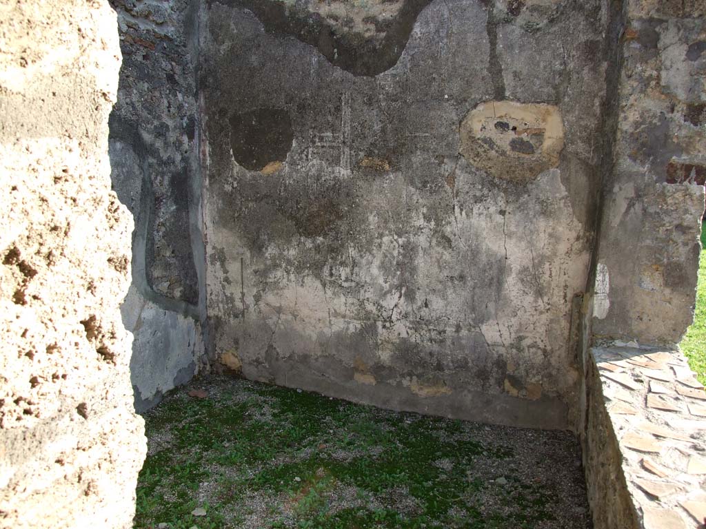 HGW24 Pompeii. December 2006. Looking south into room with window overlooking terrace. 
According to PAH, I,1,250 (and Addendum, p.118, dated 21st February 1771), this room was found with white plaster decorated with some painted yellow lines, and around it some medallions and masks. The floor was paved with simple slabs.
(Villa Diomedes Project – area 34).
(According to Fontaine, this room 2.6, would have been the room from where the medallions of masks and views would have been cut from).
(No.2 on the plan by La Vega).