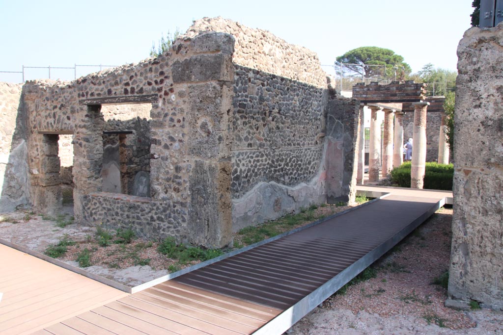 HGW24 Pompeii. Villa of Diomedes. October 2023. 
Looking north-east from terrace at rear of tablinum, towards doorway of corridor and window into room on north side of tablinum. 
Photo courtesy of Klaus Heese.