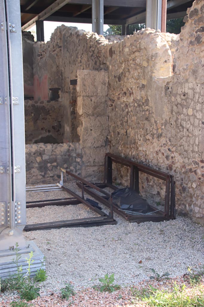 HGW24 Pompeii. Villa of Diomedes. October 2023. 
Looking east into oecus/triclinium with doorway at rear into south-west corner of peristyle. 
Photo courtesy of Klaus Heese.
(Villa Diomedes Project – area 19)
(Fontaine, 4,5).