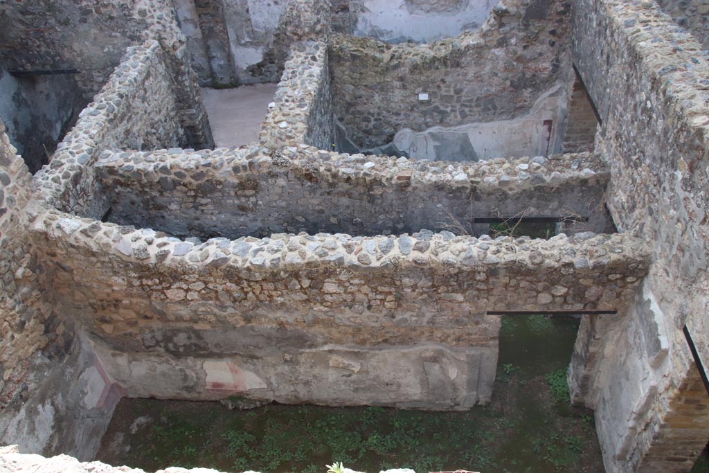 HGW24 Pompeii. Villa of Diomedes. October 2023. 
Looking south, down onto lower area to south of terrace. Photo courtesy of Klaus Heese.
(Fontaine, looking across rooms (from upper left) 5,4, stairs to lower floor, rooms 5,1 and 5,4, upper centre.
In centre - corridor 5,3, and south wall of room 5,5, on lower side.