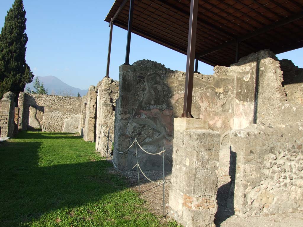 HGW24 Pompeii. December 2006. Looking north along terrace. 
The doorway to the tablinum can be seen on the left of centre of the photo, where the items numbered 3 by La Vega were found.
The doorway in the north wall, on the left of the photo, is where the items numbered 4 on the plan by La Vega were found.
It would seem the paintings from both rooms were taken at the same time, and the locations not separated. (see also the tablinum, detailed in the previous part).
Villa Diomedes Project – area 22 tablinum).
(Fontaine, room 4,2 tablinum).