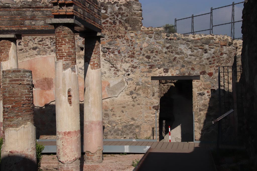 HGW24 Pompeii. Villa of Diomedes. October 2023. 
Looking north across east portico towards doorway to lower floor and garden.Photo courtesy of Klaus Heese.