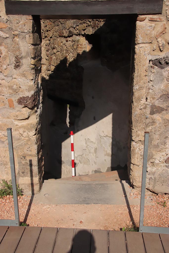 HGW24 Pompeii. Villa of Diomedes. October 2023. 
Doorway at east end of north portico, leading to lower floor. Photo courtesy of Klaus Heese.