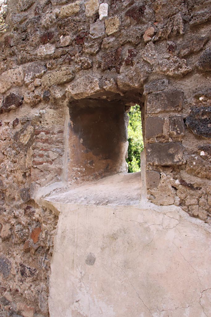 HGW24, Villa of Diomedes, Pompeii. May 2024. 
Upper east wall at side of stairs, with lararium niche in upper wall. Photo courtesy of Klaus Heese.