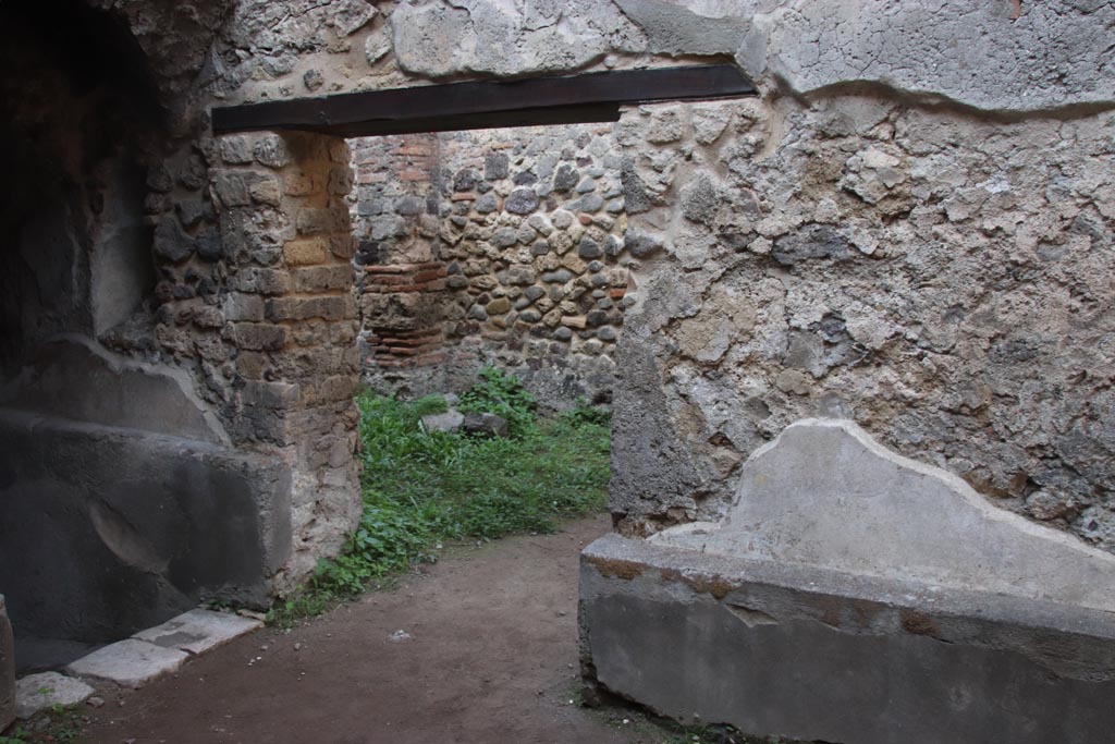 HGW24 Pompeii. Villa of Diomedes. October 2023. 
Doorway into the “wagon’s entrance”, in the north wall of this room. Photo courtesy of Klaus Heese.
(Fontaine – room 5,18 with doorway into 7,1)
