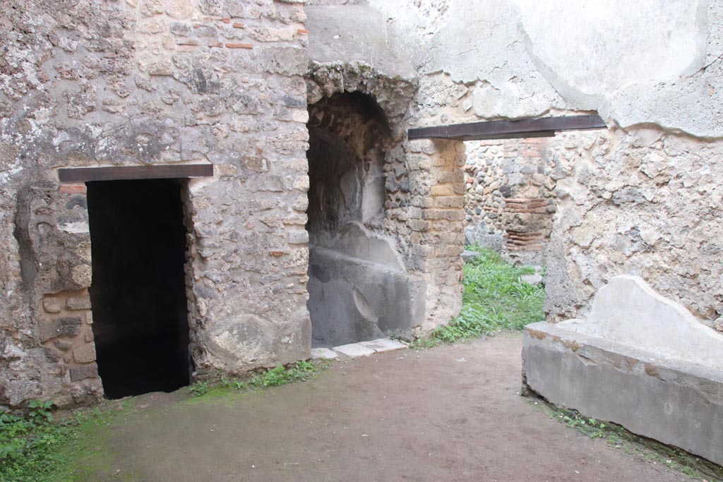 HGW24 Pompeii. Villa of Diomedes. October 2023. 
Looking west towards north-west corner, corridor to lower area, and doorway into HGW25. Photo courtesy of Klaus Heese.