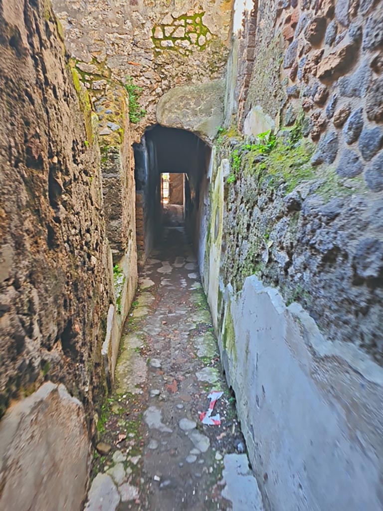 HGW24 Pompeii. March 2024. 
Looking west along corridor down to lower (garden) level. Photo courtesy of Giuseppe Ciaramella.
(Villa Diomedes Project – corridor 62).
(Fontaine, room 5,12).