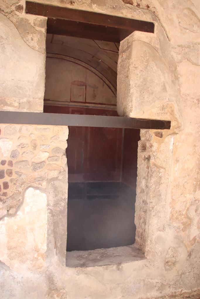 HGW24 Pompeii. Villa of Diomedes. October 2023. 
Looking east into room through window from north end of east portico. Photo courtesy of Klaus Heese.
(Villa Diomedes Project – area 61).
(Fontaine, room 5,13).