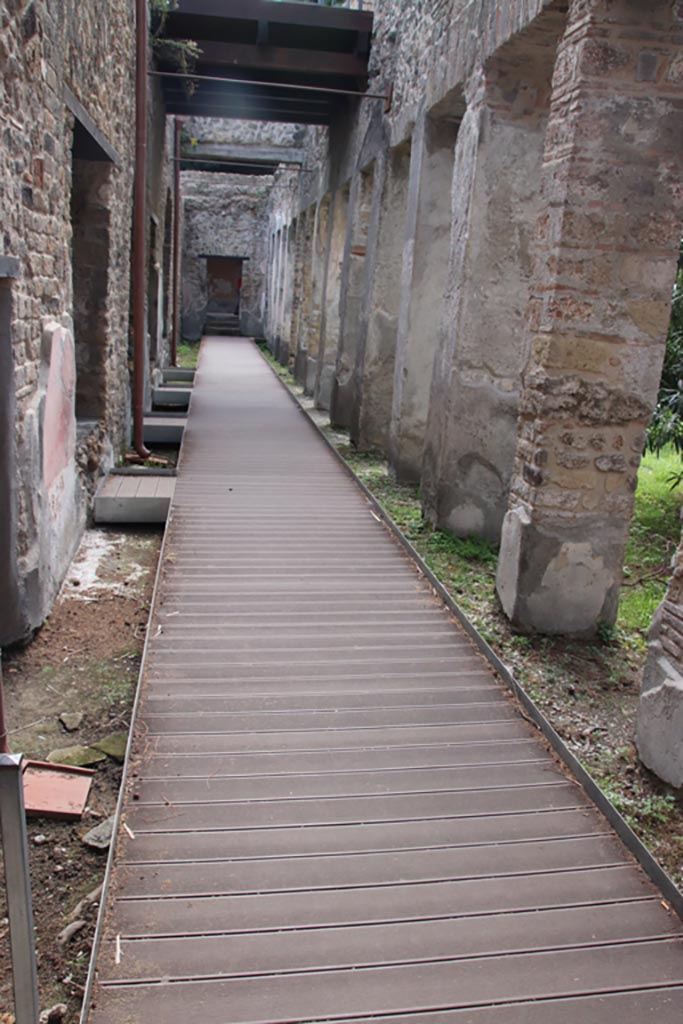 Villa of Diomedes, Pompeii. October 2023. Looking south along the east portico. 
The area of the loggia above can be seen in the upper centre of the photo. Photo courtesy of Klaus Heese.