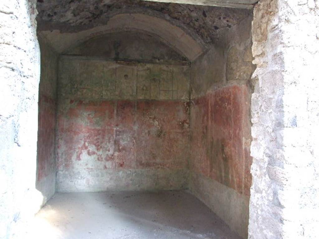 HGW24 Pompeii. December 2006.
Looking east through window into one of the richly decorated living rooms on the eastern side of the garden. 
(Fontaine, room 5,10).