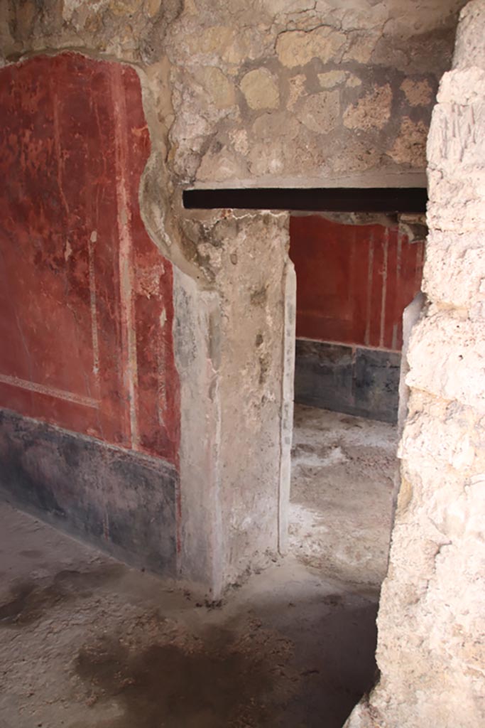 Villa of Diomedes, Pompeii. October 2023. 
Doorway at west end of south wall into next room. Photo courtesy of Klaus Heese.
(Villa Diomedes Project – area 57).
(Fontaine, room 5,10 with doorway into room 5,8).