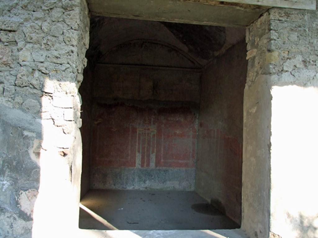 HGW24 Pompeii. December 2006.
Looking east through window into one of the richly decorated living rooms on the eastern side of the garden. 
(Fontaine, room 5,9).