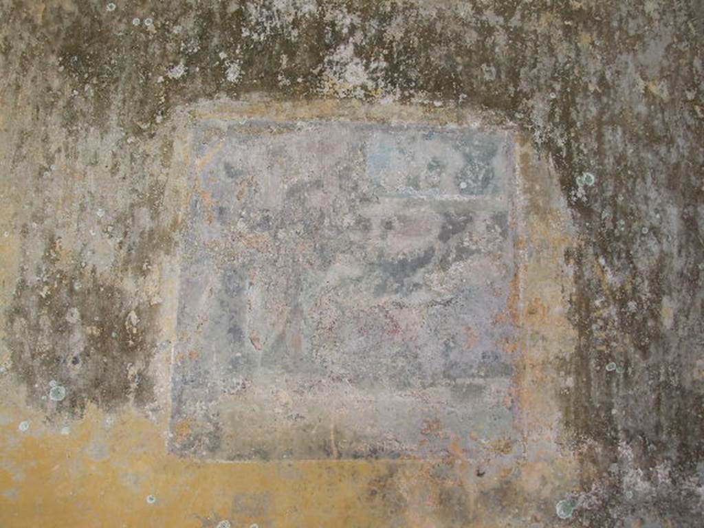 HGW24 Pompeii. December 2006.
Remains of wall painting in centre of east wall of one of the richly decorated living rooms on the eastern side of the garden. 
(Fontaine, room 5,7).
