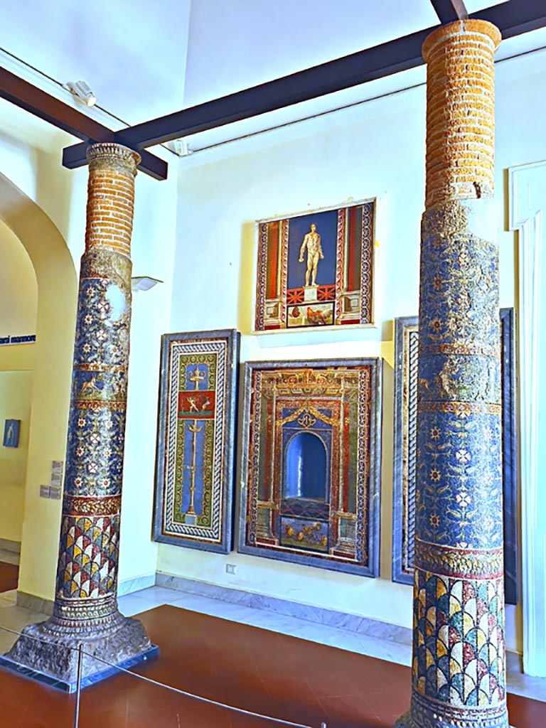 HGE12 Villa of the Mosaic Columns. September 2024.  
Two of the four columns on display in Naples Archaeological Museum. Photo courtesy of Giuseppe Ciaramella.