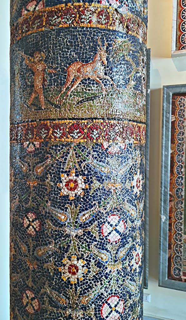 HGE12 Villa of the Mosaic Columns. September 2024.
Detail of stag and cupids lower on the mosaic column.
Now in Naples Archaeological Museum. Inventory number 10000.
Photo courtesy of Giuseppe Ciaramella.