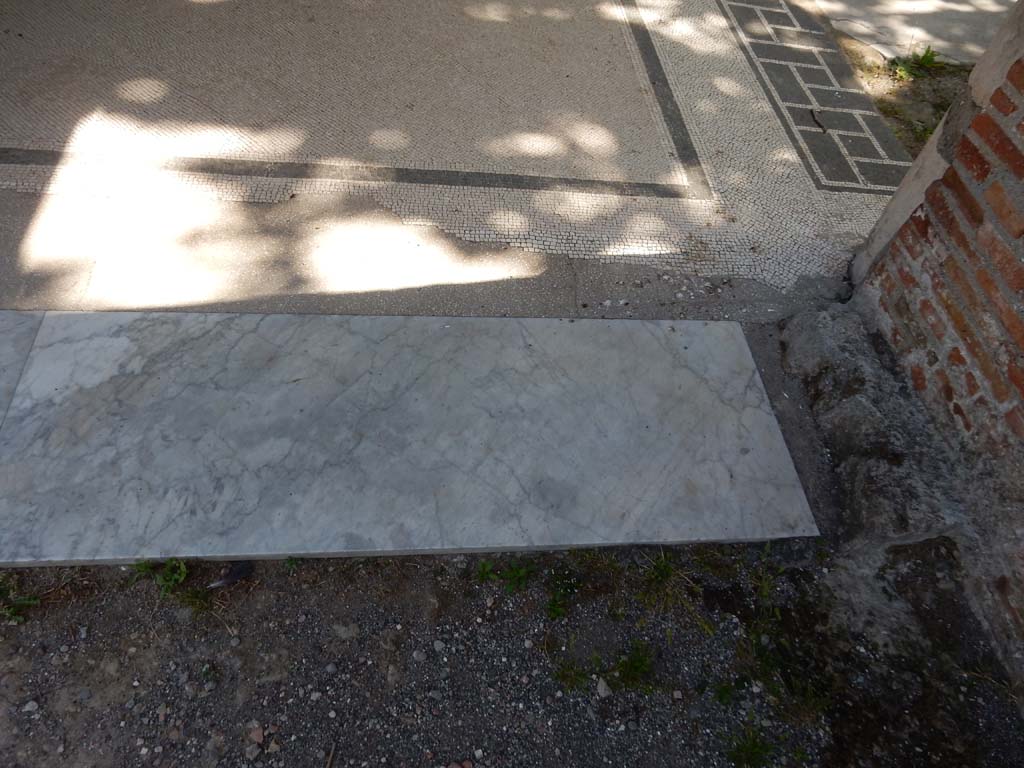 Villa San Marco, Stabiae, June 2019. Oecus 16, marble threshold in south-east corner, looking east to north portico 5. 
Photo courtesy of Buzz Ferebee