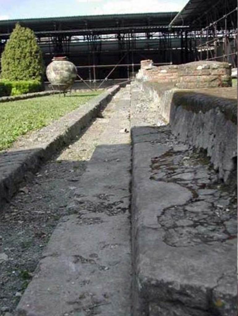 Villa San Marco, Stabiae, December 2007. Area 66, garden peristyle area. Looking east along south side of portico 1. 
1.