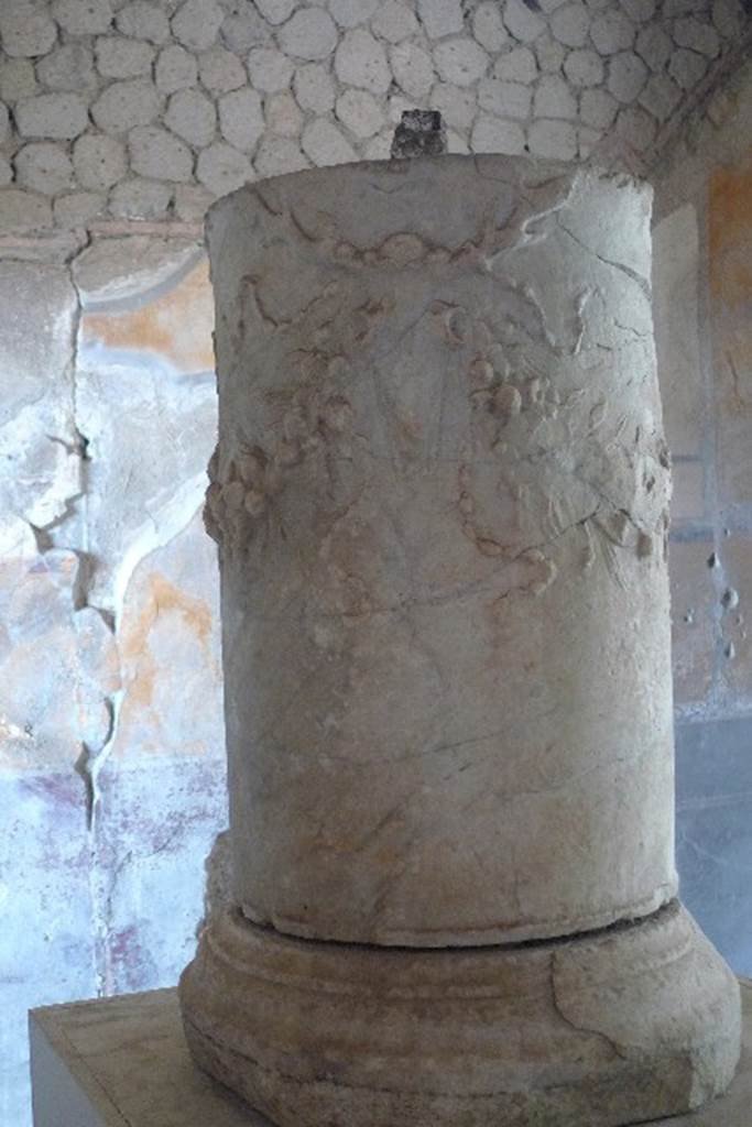 Villa San Marco, Stabiae, July 2010. 
Restored marble altar, decorated with garlands and ribbons, supported by stags heads. 
Photo courtesy of Michael Binns.