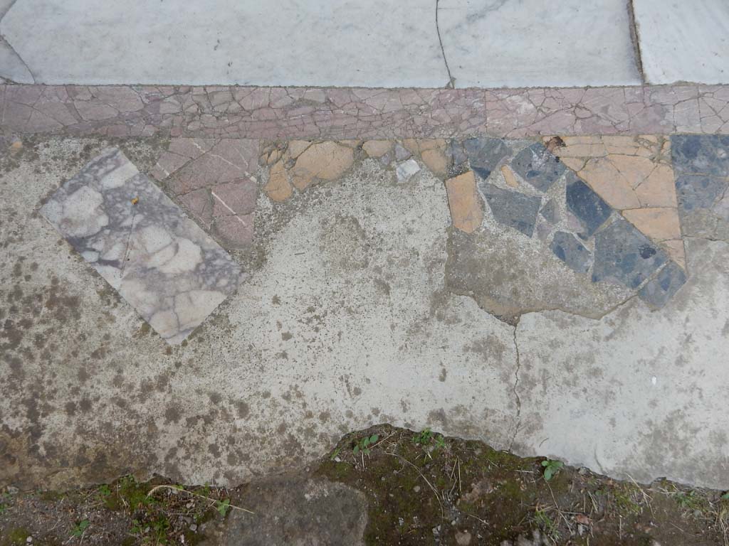 Villa San Marco, Stabiae, June 2019. Looking west at doorway threshold to north portico 5, from south end of pool. 
Photo courtesy of Buzz Ferebee