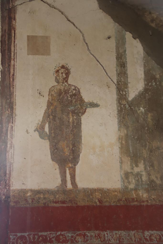 Villa San Marco, Stabiae, October 2022. 
Room 8, detail of figure to right of window in east wall. Photo courtesy of Klaus Heese.