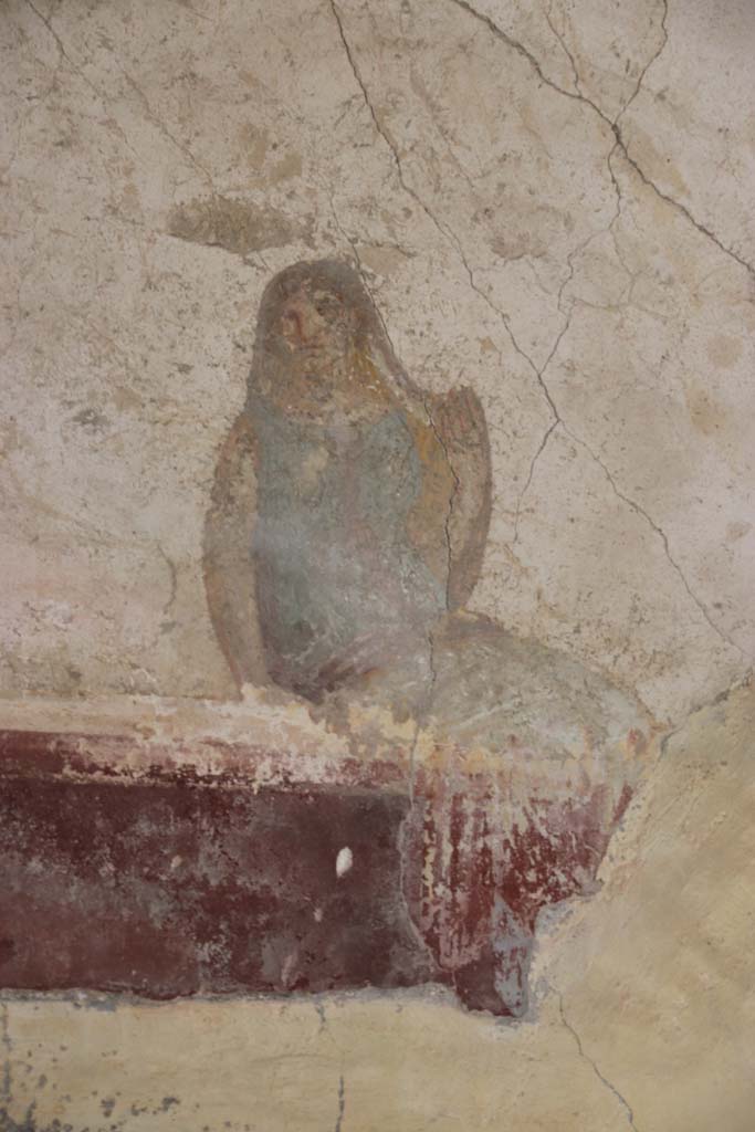 Villa San Marco, Stabiae, September 2019. Room 14, fresco of seated figure on north wall. Photo courtesy of Klaus Heese.