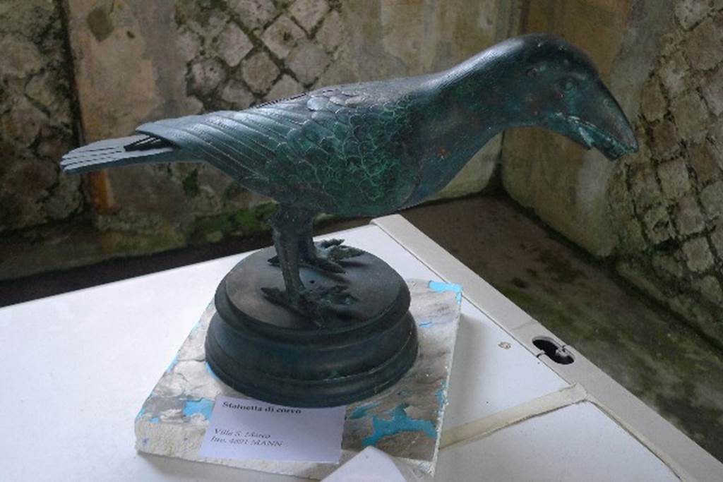 Castellammare di Stabia, Villa San Marco, July 2010. Room 12.
Reproduction of bronze crow found and reported on 17th July 1751, during the Bourbon excavations. Photo courtesy of Michael Binns. The original is in the Naples Archaeological Museum. Inventory number 4891. See Pagano, M. and Prisciandaro, R., 2006. Studio sulle provenienze degli oggetti rinvenuti negli scavi borbonici del regno di Napoli. Naples : Nicola Longobardi. (p.237).  See Parslow, C.C. (1998). Rediscovering Antiquity: Karl Weber and the Excavation of Herculaneum, Pompeii and Stabiae. UK,Cambridge UP (p.177 & p.356, note 49).