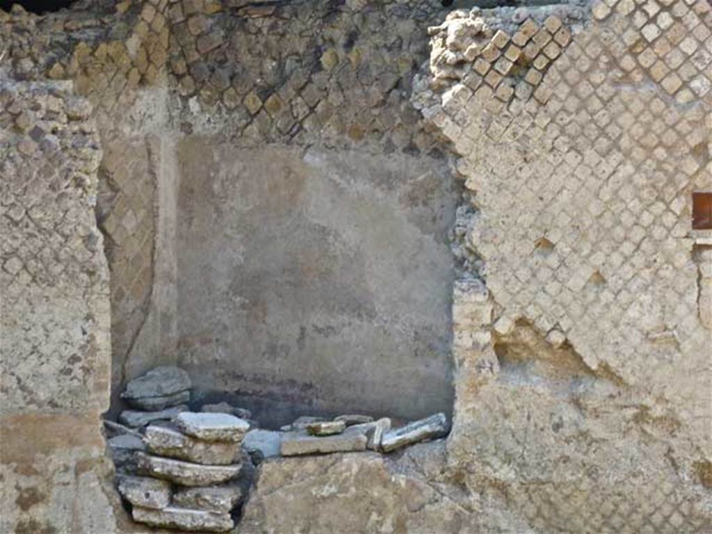 Villa San Marco, Stabiae, July 2010. Photo courtesy of Michael Binns.
According to Terpstra et al, this is one of three triangular shaped rooms, the largest two both being latrines. 
This, the smallest and most southerly, had its walls and floor lined with hydraulic plaster. 
It seems to have served as a cistern, although it has one window, which was possibly a later architectural addition. 
See Terpstra T, The 2011 Field season preliminary Report at http://www.fastionline.org/docs/FOLDER-it-2012-259.pdf