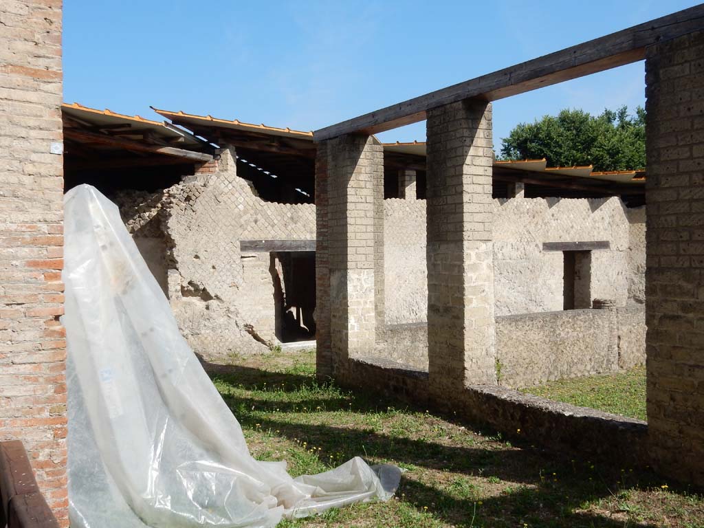 Villa San Marco, Stabiae, June 2019. Looking towards the rooms on the north-west side of the peristyle.  
Photo courtesy of Buzz Ferebee.