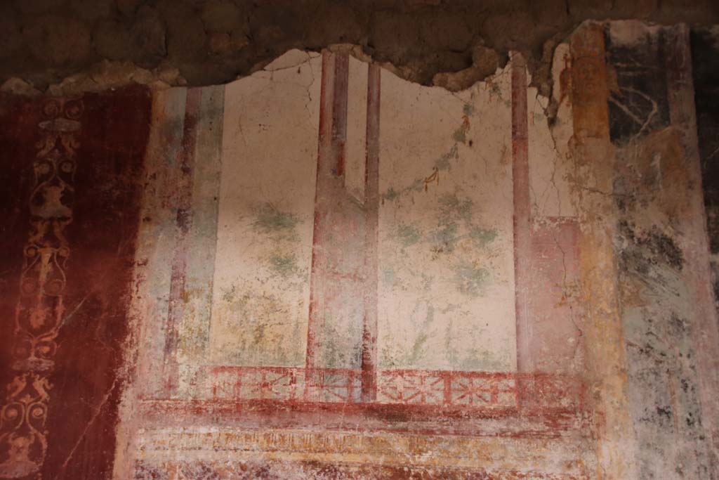 Villa San Marco, Stabiae, October 2020. 
Room 44, north wall, detail of painted decoration from west side of central painting. Photo courtesy of Klaus Heese