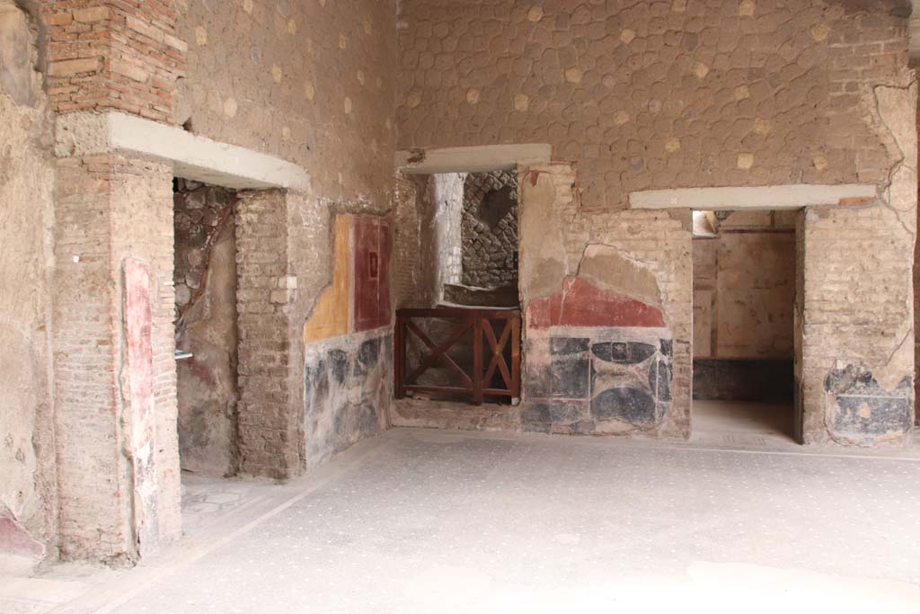 Villa San Marco, Stabiae, September 2019.  
Room 44, south-east corner of atrium, with corridor 59a on left, steps 55 to upper floor (centre left) and doorway to room 61 (on right). 
Photo courtesy of Klaus Heese.