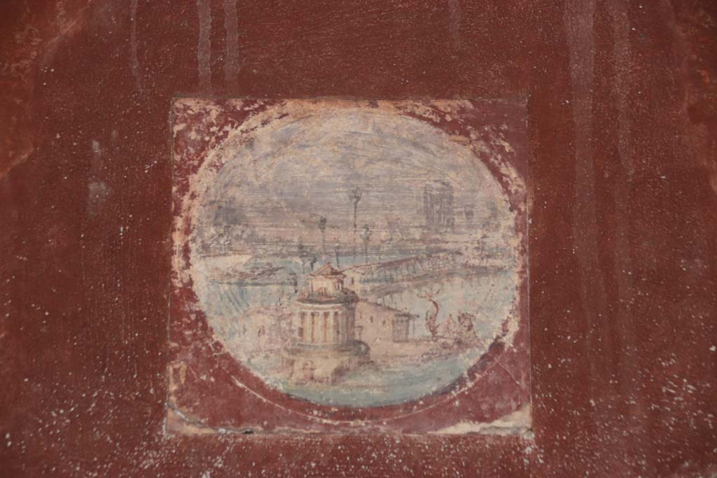 Villa San Marco, Stabiae, September 2019. Room 20, reproduction of medallion from east wall, (to the left of the hole in the wall). 
(original now in Naples Archaeological Museum, inventory number 9409B.)