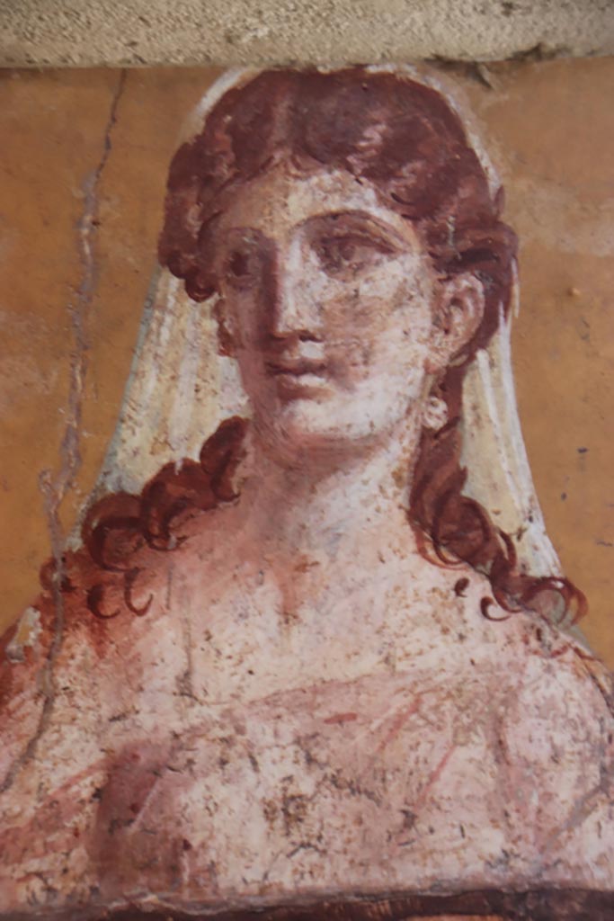Villa San Marco, Stabiae, October 2022.  
Room 50, detail of painted figure from north end of east wall. Photo courtesy of Klaus Heese.