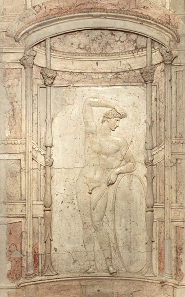 Castellammare di Stabia, Villa San Marco. Room 65, stucco relief of athlete from lower wall of niche 7 of the nymphaeum. Now in Naples Archaeological Museum.  Inventory number 9578.
According to Parslow, this stucco relief of a gymnast with a hoop was removed in August 1752, and taken to the museum at Portici. See Parslow, C.C. (1998). Rediscovering Antiquity: Karl Weber and the Excavation of Herculaneum, Pompeii and Stabiae. UK,Cambridge UP (p.178-9, fig.50). Underneath this was a painting of Diana and Acteon.