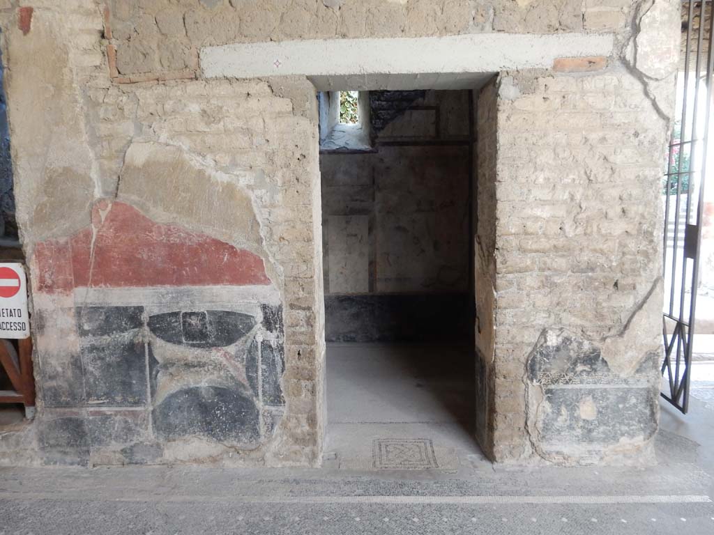 Villa San Marco, Stabiae, June 2019. Looking south to doorway to room 61, in south-east corner of atrium. 
Photo courtesy of Buzz Ferebee.