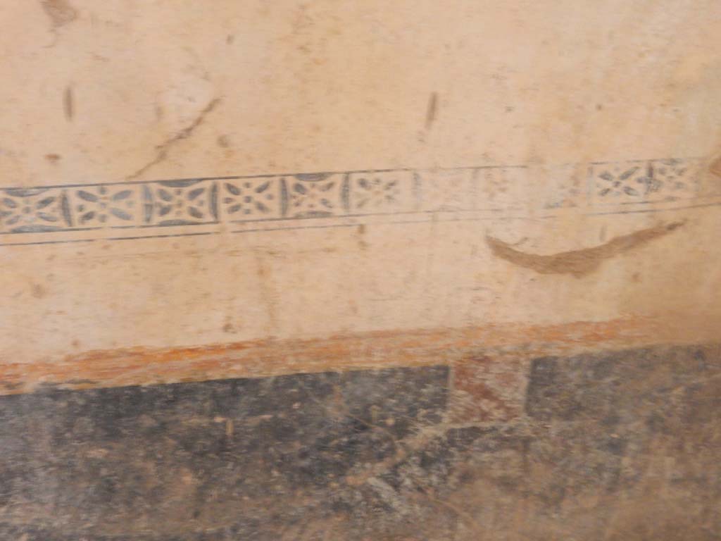 Villa San Marco, Stabiae, June 2019. Room 61, detail of painted decoration at south end of west wall.
Photo courtesy of Buzz Ferebee.