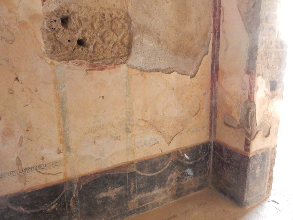 Villa San Marco, Stabiae, June 2019. Room 61, west wall and north-west corner with doorway, on right.
Photo courtesy of Buzz Ferebee.
