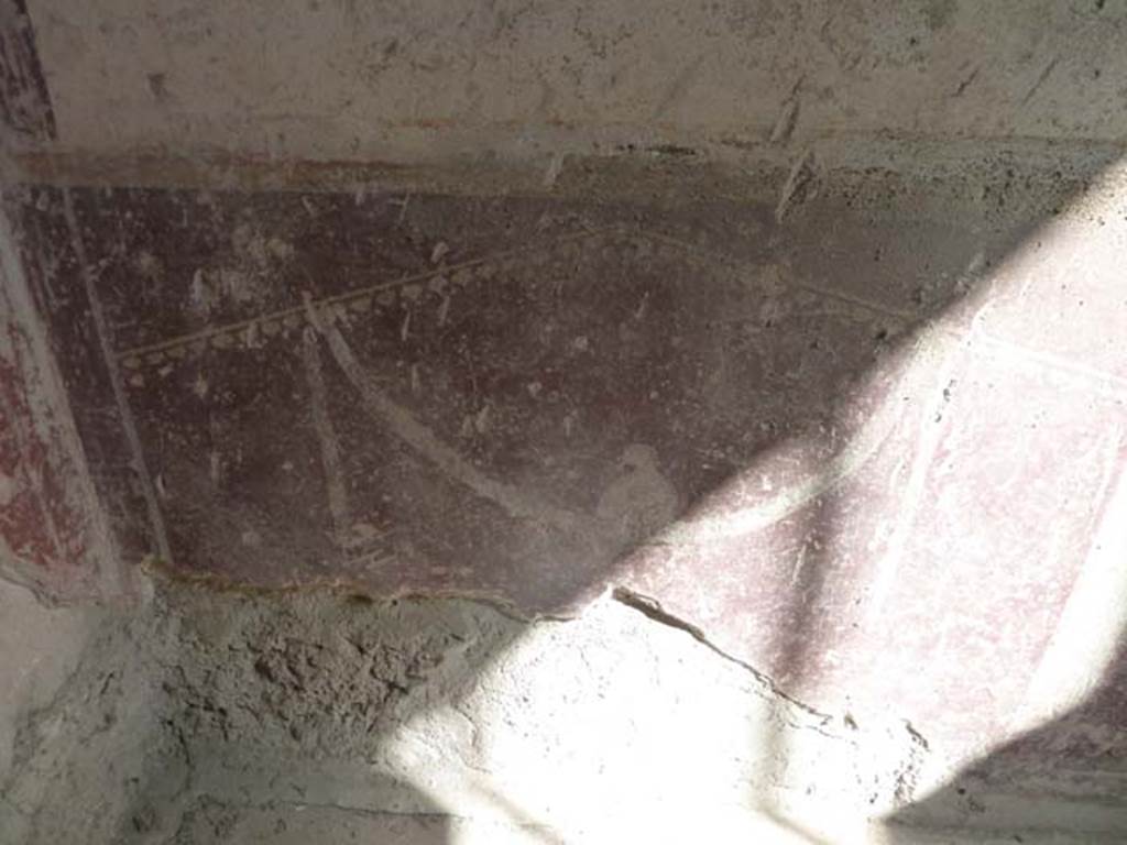 Villa San Marco, Stabiae, September 2015. Room 57, painted zoccolo on east wall in north-east corner.