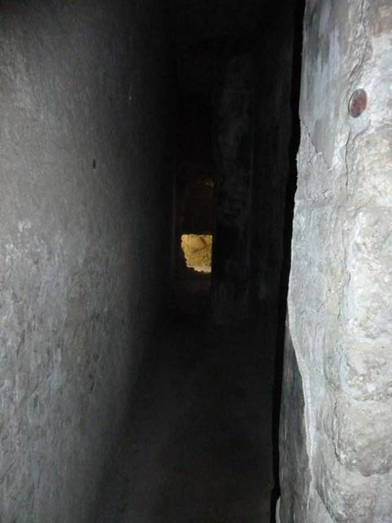 Villa San Marco, Stabiae, September 2015. 
Looking from corridor 49 into rooms 39 and 27, servants areas.
The large irregular hole in the end wall is through the wall into room 26.