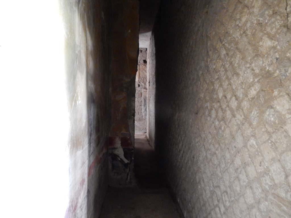Villa San Marco, Stabiae, June 2019. Room 26, looking north into room 27, and the narrow corridor 39 that joins with corridor 49.
Photo courtesy of Buzz Ferebee