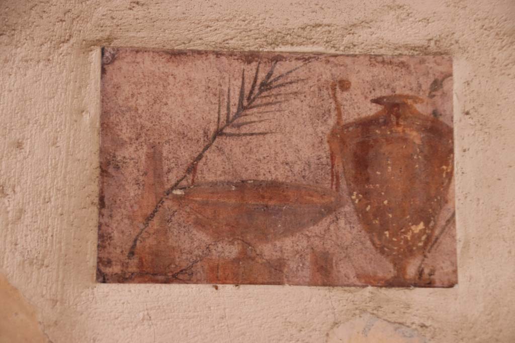 Villa San Marco, Stabiae, September 2021. Room 52, painted panel from west end of north wall. Photo courtesy of Klaus Heese. 
Original now in Naples Archaeological Museum. Part of inventory number 9952.