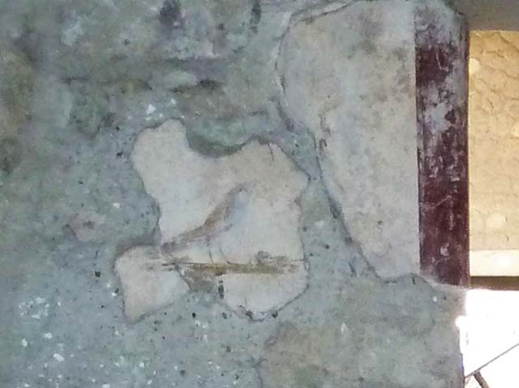 Villa San Marco, Stabiae, September 2015. Room 52, painted bird from north side of doorway in east wall.