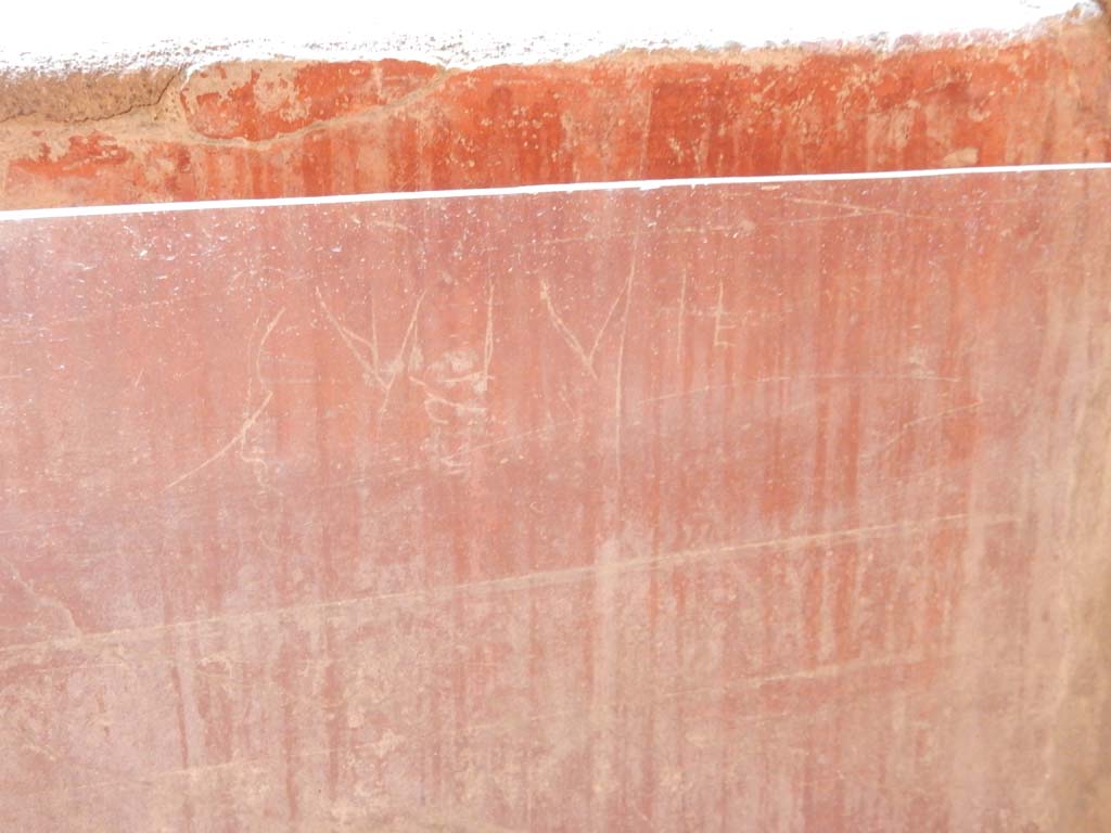 Villa San Marco, Stabiae, June 2019. Corridor 32, graffiti found at south end of east wall.  
Photo courtesy of Buzz Ferebee