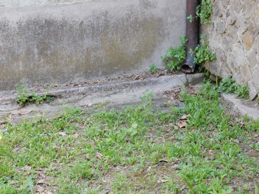 Villa San Marco, Stabiae, June 2019. Room 19, gutter under north wall in north-east corner. 
Photo courtesy of Buzz Ferebee
