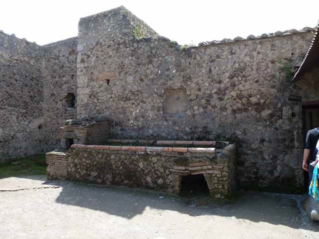 Villa of Mysteries, Pompeii. May 2010. Room 61, west wall with hearth and oven, and remains of niche.