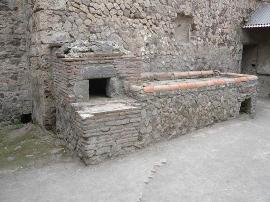 Villa of Mysteries, Pompeii. May 2012. Room 61, kitchen courtyard. Looking west towards the oven and hearth. Photo courtesy of Buzz Ferebee.