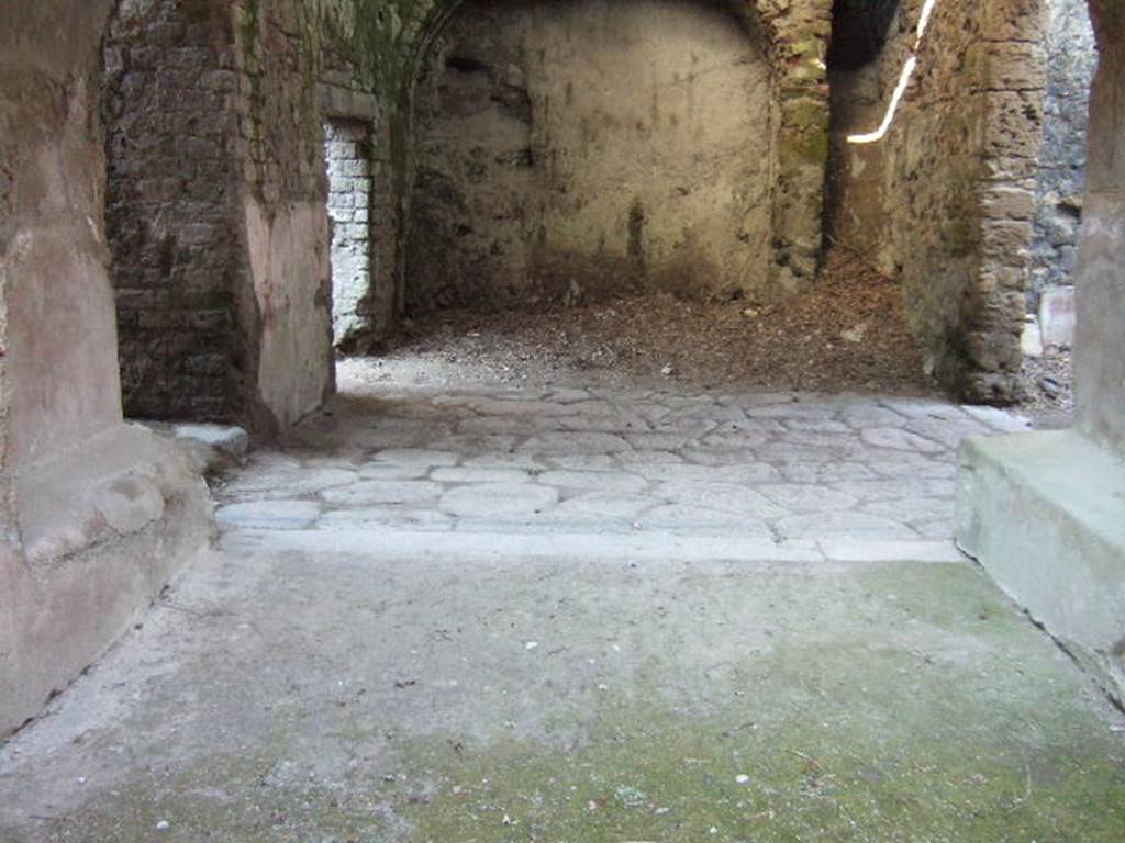 Villa of Mysteries, Pompeii. May 2006. Room 66, flooring made of lava stone, similar to the streets of Pompeii. This allowed the carts to enter the villa to be loaded and unloaded.